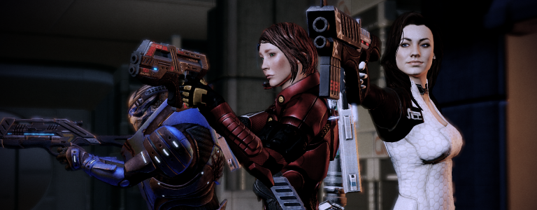 Garrus, Shepard, and Miranda hold their guns at the ready.