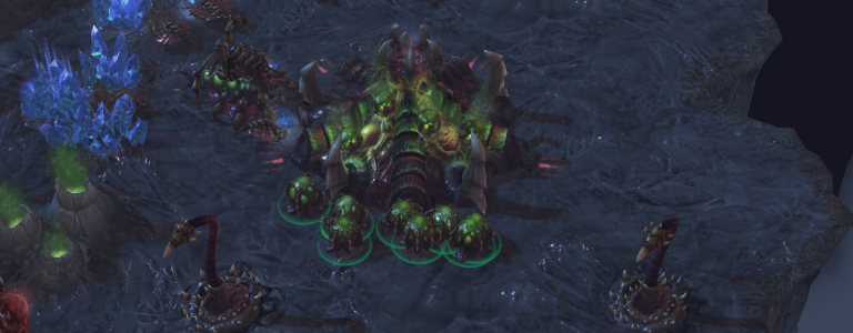 A Zerg hatchery with a number of eggs around it.