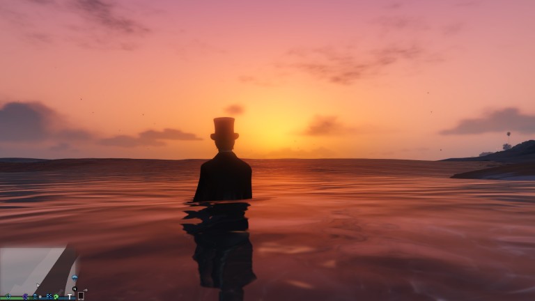 Nerdsworth enjoying the beach sunset in a top hat. 